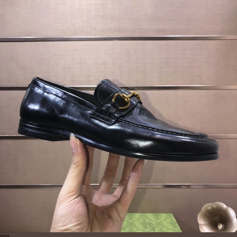 G*u*i leather shoes